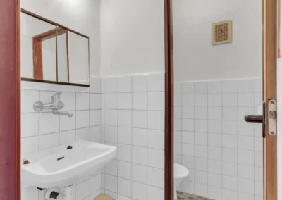 Koupelna a WC v prvním obytném patře